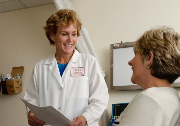 Cardiologist speaking with a patient in a clinic
